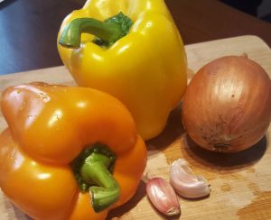 orange pepper, yellow pepper, yellow onion, garlic